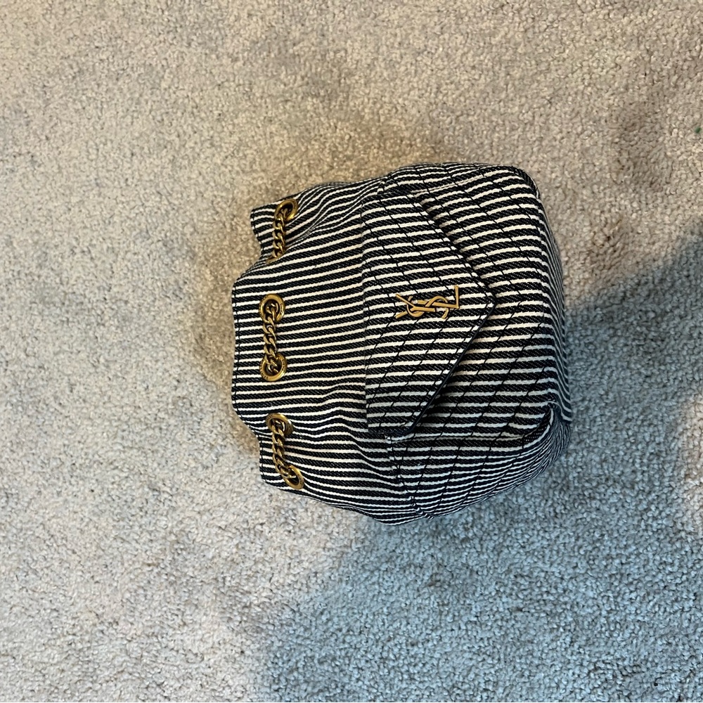 Saint Laurent Crossbody

Striped Black and White Bag with Gold Accents